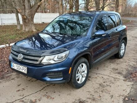 Синий Фольксваген Тигуан, объемом двигателя 2 л и пробегом 200 тыс. км за 11500 $, фото 1 на Automoto.ua