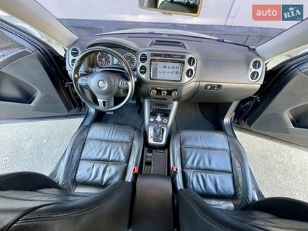 Синий Фольксваген Тигуан, объемом двигателя 2 л и пробегом 165 тыс. км за 16200 $, фото 1 на Automoto.ua