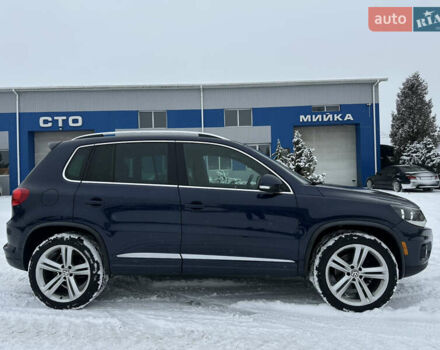 Синий Фольксваген Тигуан, объемом двигателя 2 л и пробегом 238 тыс. км за 12850 $, фото 1 на Automoto.ua