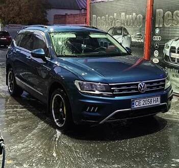 Синий Фольксваген Тигуан, объемом двигателя 1.98 л и пробегом 124 тыс. км за 16000 $, фото 1 на Automoto.ua