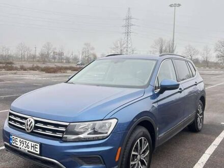 Синий Фольксваген Тигуан, объемом двигателя 2 л и пробегом 144 тыс. км за 19700 $, фото 1 на Automoto.ua