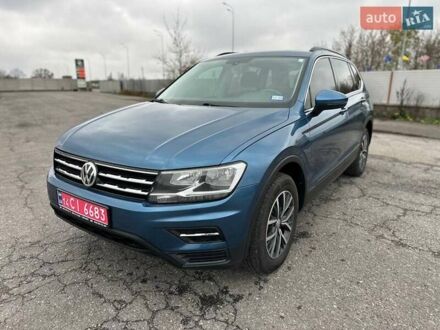 Синий Фольксваген Тигуан, объемом двигателя 2 л и пробегом 213 тыс. км за 17800 $, фото 1 на Automoto.ua