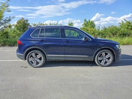 Синій Фольксваген Тігуан, об'ємом двигуна 2 л та пробігом 165 тис. км за 23500 $, фото 1 на Automoto.ua