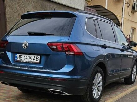 Синий Фольксваген Тигуан, объемом двигателя 2 л и пробегом 153 тыс. км за 19350 $, фото 1 на Automoto.ua