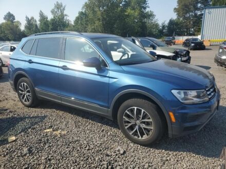 Синий Фольксваген Тигуан, объемом двигателя 2 л и пробегом 136 тыс. км за 369 $, фото 1 на Automoto.ua