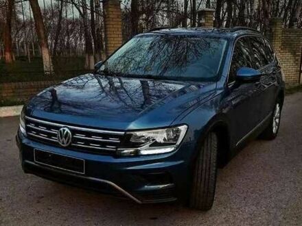 Синий Фольксваген Тигуан, объемом двигателя 2 л и пробегом 109 тыс. км за 14500 $, фото 1 на Automoto.ua