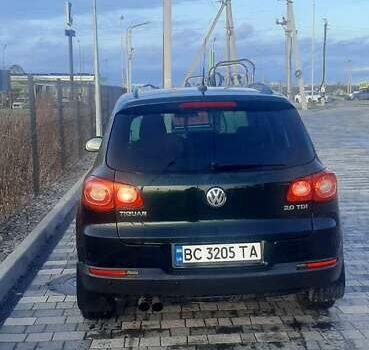 Зеленый Фольксваген Тигуан, объемом двигателя 2 л и пробегом 255 тыс. км за 10200 $, фото 1 на Automoto.ua