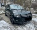 Зелений Фольксваген Тігуан, об'ємом двигуна 2 л та пробігом 250 тис. км за 12500 $, фото 1 на Automoto.ua
