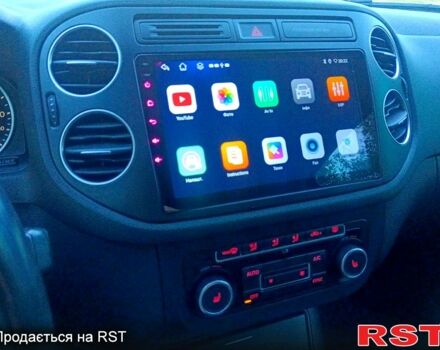 Зелений Фольксваген Тігуан, об'ємом двигуна 2 л та пробігом 280 тис. км за 13700 $, фото 6 на Automoto.ua