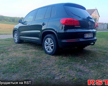 Зелений Фольксваген Тігуан, об'ємом двигуна 2 л та пробігом 280 тис. км за 13700 $, фото 7 на Automoto.ua