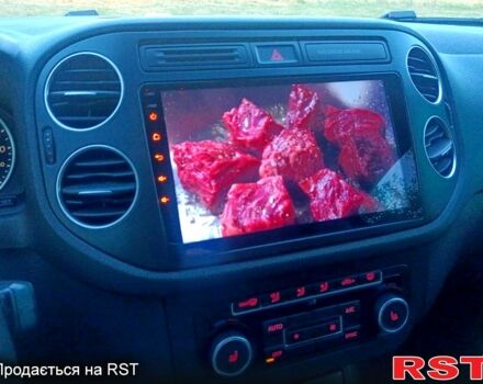 Зелений Фольксваген Тігуан, об'ємом двигуна 2 л та пробігом 280 тис. км за 13700 $, фото 1 на Automoto.ua