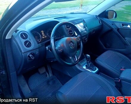 Зелений Фольксваген Тігуан, об'ємом двигуна 2 л та пробігом 280 тис. км за 13700 $, фото 5 на Automoto.ua