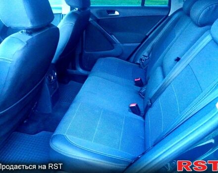 Зелений Фольксваген Тігуан, об'ємом двигуна 2 л та пробігом 280 тис. км за 13700 $, фото 2 на Automoto.ua