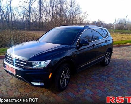 Зеленый Фольксваген Тигуан, объемом двигателя 2 л и пробегом 156 тыс. км за 16850 $, фото 2 на Automoto.ua