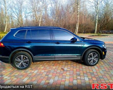 Зеленый Фольксваген Тигуан, объемом двигателя 2 л и пробегом 156 тыс. км за 16850 $, фото 4 на Automoto.ua