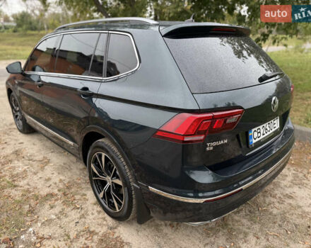 Зелений Фольксваген Тігуан, об'ємом двигуна 2 л та пробігом 170 тис. км за 19900 $, фото 4 на Automoto.ua