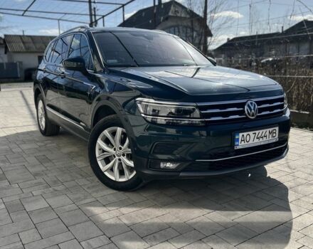 Зеленый Фольксваген Тигуан, объемом двигателя 2 л и пробегом 208 тыс. км за 30900 $, фото 1 на Automoto.ua