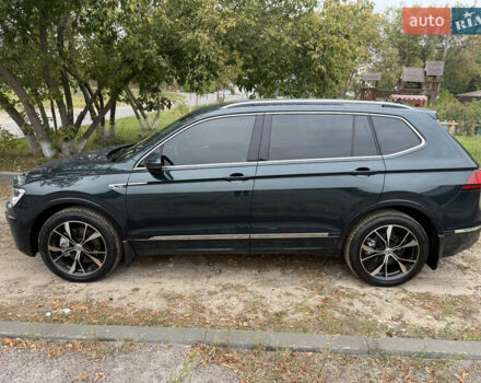 Зелений Фольксваген Тігуан, об'ємом двигуна 2 л та пробігом 170 тис. км за 19900 $, фото 1 на Automoto.ua