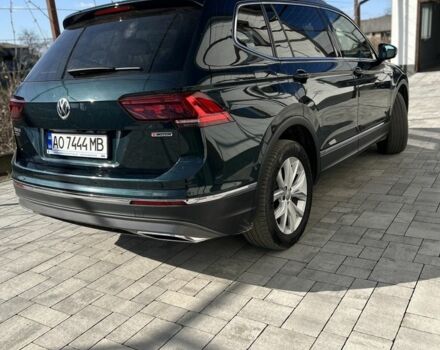 Зеленый Фольксваген Тигуан, объемом двигателя 2 л и пробегом 208 тыс. км за 30900 $, фото 3 на Automoto.ua