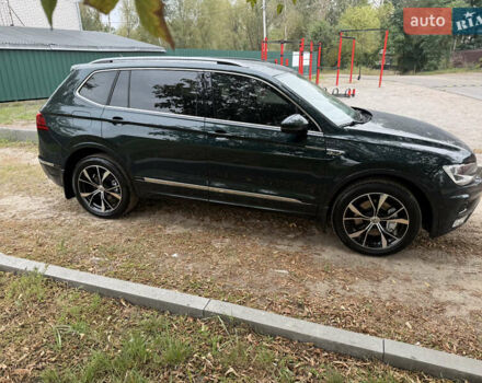 Зелений Фольксваген Тігуан, об'ємом двигуна 2 л та пробігом 170 тис. км за 19900 $, фото 34 на Automoto.ua