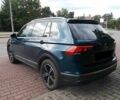 Зеленый Фольксваген Тигуан, объемом двигателя 2 л и пробегом 54 тыс. км за 11200 $, фото 3 на Automoto.ua
