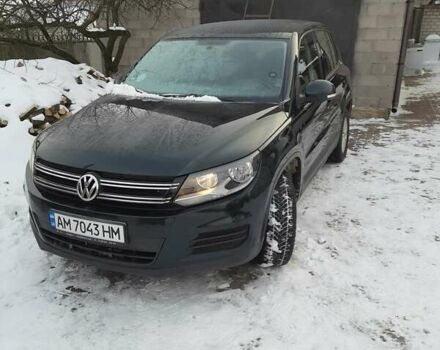 Зеленый Фольксваген Тигуан, объемом двигателя 1.97 л и пробегом 260 тыс. км за 14150 $, фото 1 на Automoto.ua