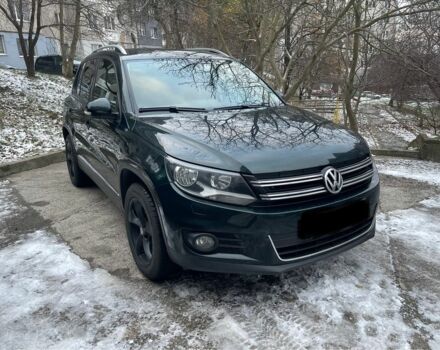 Зелений Фольксваген Тігуан, об'ємом двигуна 2 л та пробігом 250 тис. км за 12500 $, фото 1 на Automoto.ua