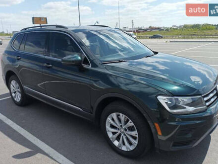 Зеленый Фольксваген Тигуан, объемом двигателя 1.98 л и пробегом 128 тыс. км за 19500 $, фото 1 на Automoto.ua