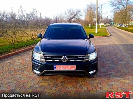 Зеленый Фольксваген Тигуан, объемом двигателя 2 л и пробегом 156 тыс. км за 16850 $, фото 1 на Automoto.ua