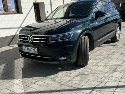 Зеленый Фольксваген Тигуан, объемом двигателя 2 л и пробегом 208 тыс. км за 30900 $, фото 1 на Automoto.ua