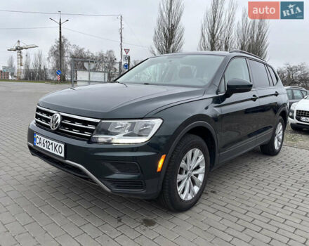 Зеленый Фольксваген Тигуан, объемом двигателя 2 л и пробегом 160 тыс. км за 16700 $, фото 1 на Automoto.ua