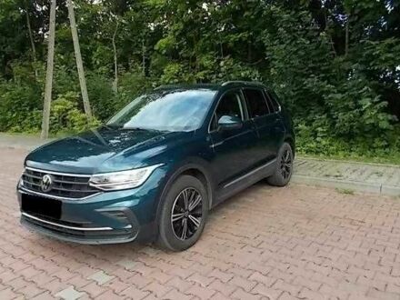 Зеленый Фольксваген Тигуан, объемом двигателя 2 л и пробегом 54 тыс. км за 11200 $, фото 1 на Automoto.ua