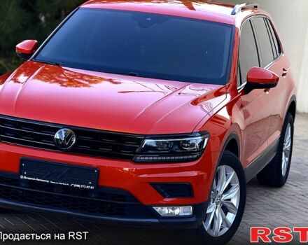 Оранжевый Фольксваген Тигуан, объемом двигателя 2 л и пробегом 160 тыс. км за 23700 $, фото 4 на Automoto.ua