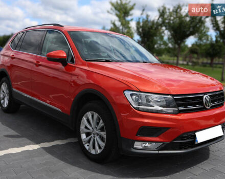 Помаранчевий Фольксваген Тігуан, об'ємом двигуна 2 л та пробігом 146 тис. км за 21000 $, фото 2 на Automoto.ua