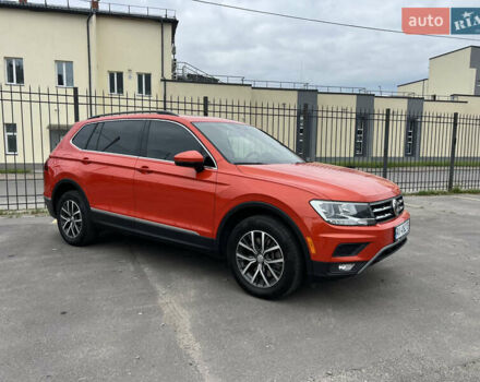 Помаранчевий Фольксваген Тігуан, об'ємом двигуна 1.98 л та пробігом 58 тис. км за 18900 $, фото 2 на Automoto.ua