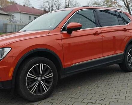 Оранжевый Фольксваген Тигуан, объемом двигателя 1.98 л и пробегом 148 тыс. км за 16200 $, фото 2 на Automoto.ua