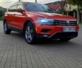 Помаранчевий Фольксваген Тігуан, об'ємом двигуна 2 л та пробігом 100 тис. км за 24500 $, фото 1 на Automoto.ua