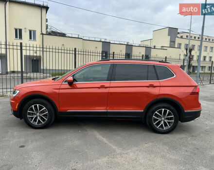 Помаранчевий Фольксваген Тігуан, об'ємом двигуна 1.98 л та пробігом 58 тис. км за 18900 $, фото 3 на Automoto.ua