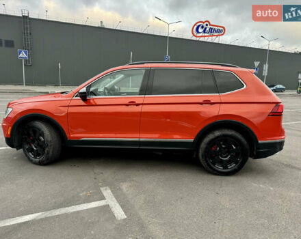 Помаранчевий Фольксваген Тігуан, об'ємом двигуна 1.98 л та пробігом 176 тис. км за 16690 $, фото 3 на Automoto.ua