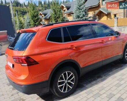 Помаранчевий Фольксваген Тігуан, об'ємом двигуна 1.98 л та пробігом 104 тис. км за 16200 $, фото 4 на Automoto.ua