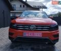 Помаранчевий Фольксваген Тігуан, об'ємом двигуна 1.98 л та пробігом 104 тис. км за 16200 $, фото 1 на Automoto.ua