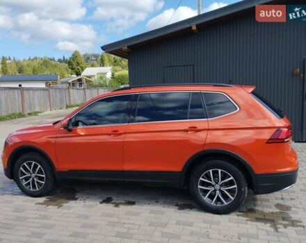 Помаранчевий Фольксваген Тігуан, об'ємом двигуна 1.98 л та пробігом 104 тис. км за 16200 $, фото 7 на Automoto.ua