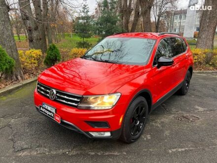 Оранжевый Фольксваген Тигуан, объемом двигателя 2 л и пробегом 176 тыс. км за 17790 $, фото 1 на Automoto.ua