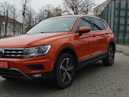Помаранчевий Фольксваген Тігуан, об'ємом двигуна 1.98 л та пробігом 148 тис. км за 16200 $, фото 1 на Automoto.ua