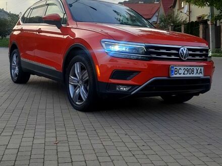 Оранжевый Фольксваген Тигуан, объемом двигателя 2 л и пробегом 100 тыс. км за 24500 $, фото 1 на Automoto.ua