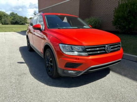 Помаранчевий Фольксваген Тігуан, об'ємом двигуна 2 л та пробігом 31 тис. км за 9000 $, фото 1 на Automoto.ua