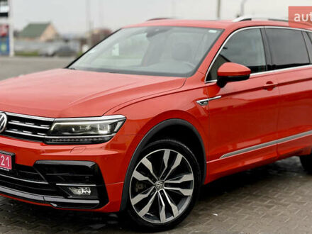 Оранжевый Фольксваген Тигуан, объемом двигателя 2 л и пробегом 152 тыс. км за 25900 $, фото 1 на Automoto.ua