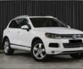 Белый Фольксваген Туарег, объемом двигателя 3 л и пробегом 286 тыс. км за 16900 $, фото 1 на Automoto.ua