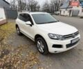 Белый Фольксваген Туарег, объемом двигателя 2.97 л и пробегом 265 тыс. км за 18000 $, фото 1 на Automoto.ua