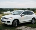 Белый Фольксваген Туарег, объемом двигателя 3 л и пробегом 289 тыс. км за 17500 $, фото 1 на Automoto.ua